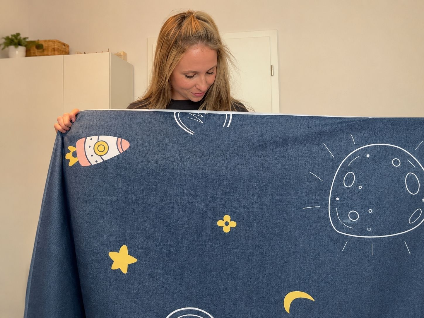 L'alèse Dorlin™ installée sur le lit d'un enfant